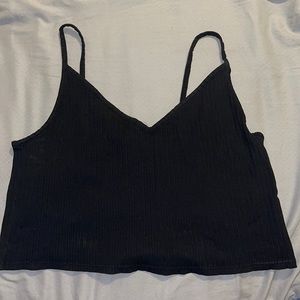 This is an H&M Black crop top. Size XL large. You can wear a bra or no bra.